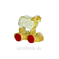 Little sheep on wheel board