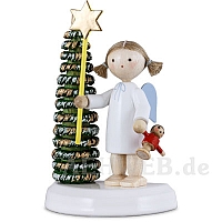 Angel at the Christmas tree with star and doll