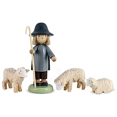 Shepherd with three sheep