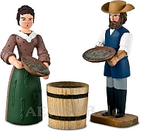 Man and woman with water barrel