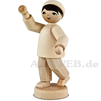 Boy with christmas ornaments, natural wood