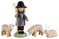 Shepherd with three sheep