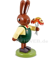 Easter bunny with bouquet of flowers and green pants