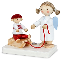 Angel with doll on sleigh no.20 from Flade